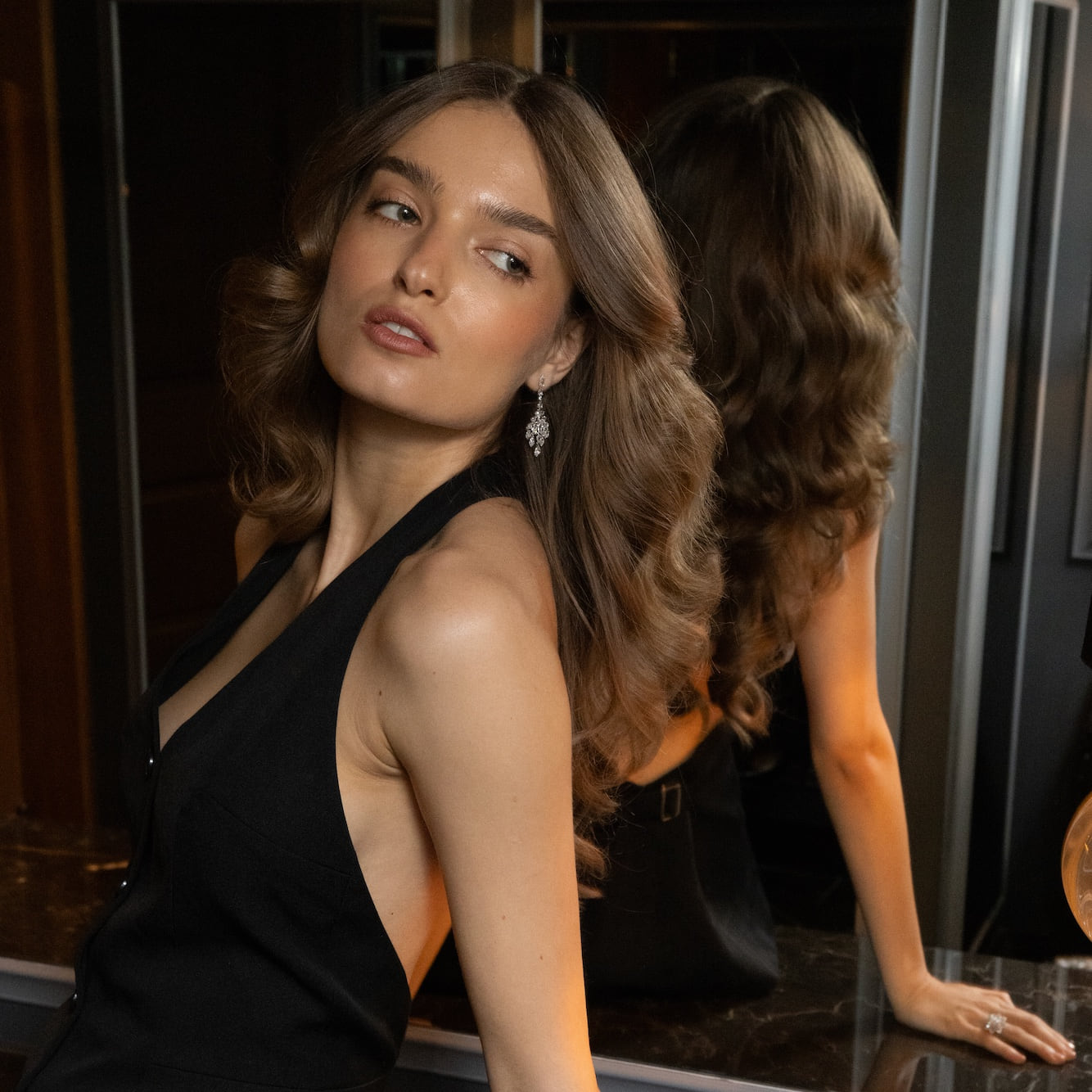 Laurenti Aurelia rose-cut diamond earrings worn on a model