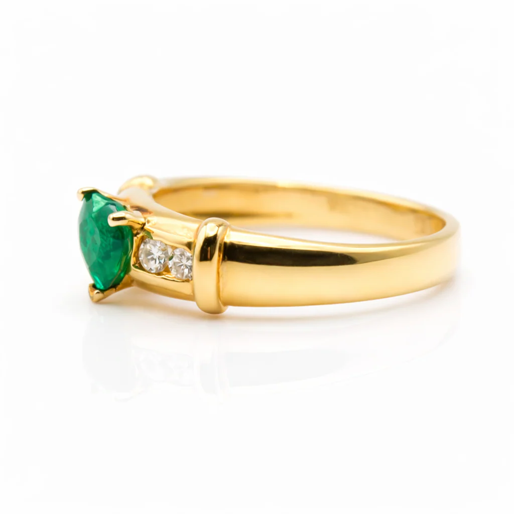 Heart-shaped natural emerald and diamond ring